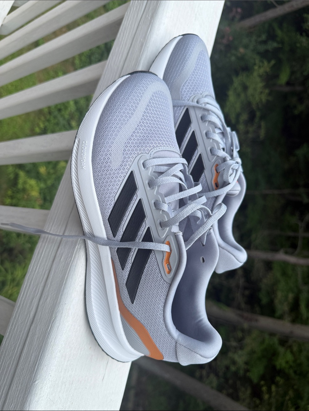 adidas Light Gray Sneakers with Black Stripes and Orange Details